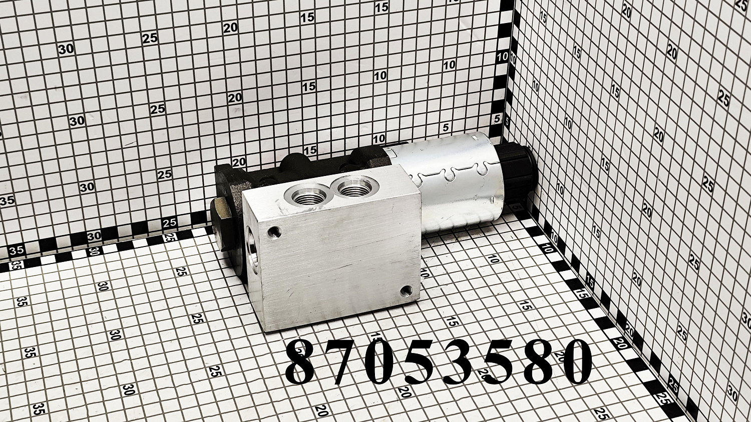 Клапан 87053580 CNHi
